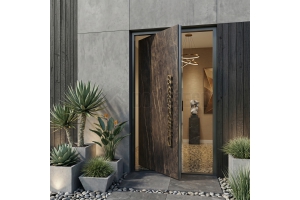 Aluminium pivot door covered with Noir Desir sintered quartz