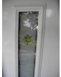 PIVOT CL11 - glazed traditional aluminum pivot door with decorative frame