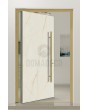 PIVOT Cristallo - aluminium pivot door covered with Cristallo sintered quartz